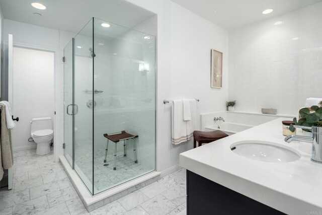 14730 Caminito Porta Delgada, Del Mar, CA 92014 - bathroom featuring marble finish flooring, a stall shower, toilet, recessed lighting, and vanity