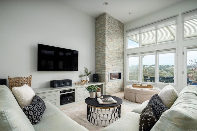 14730 Caminito Porta Delgada, Del Mar, CA 92014 - living area with a stone fireplace and a high ceiling