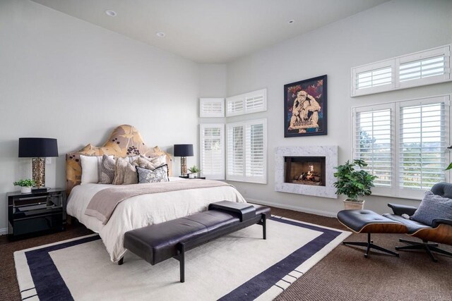 14730 Caminito Porta Delgada, Del Mar, CA 92014 - bedroom featuring carpet, a premium fireplace, a high ceiling, and baseboards