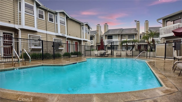 community pool with fence