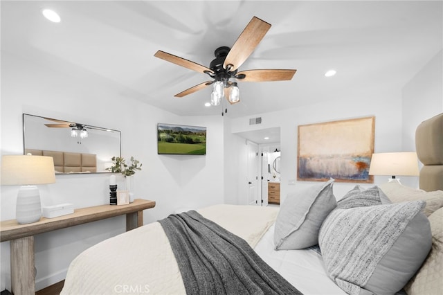 bedroom with a ceiling fan, recessed lighting, visible vents, and connected bathroom