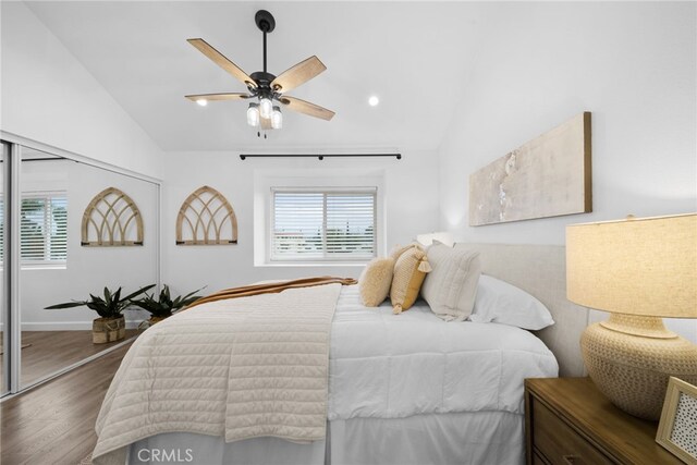 bedroom featuring a ceiling fan, lofted ceiling, recessed lighting, and wood finished floors