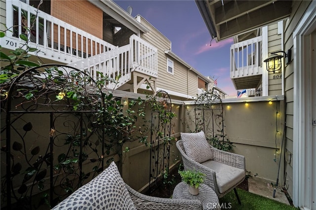 view of patio / terrace featuring fence