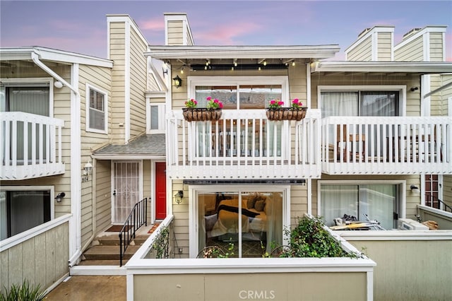 exterior space with a balcony