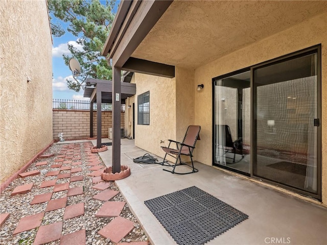 view of patio with fence