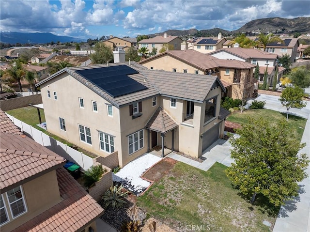 aerial view with a residential view and a mountain view