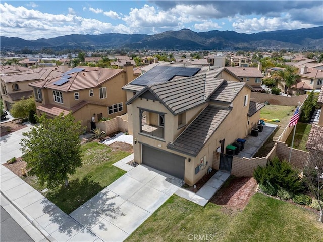 bird's eye view featuring a residential view and a mountain view