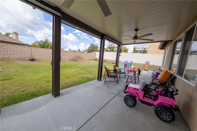 view of patio / terrace with a fenced backyard and ceiling fan