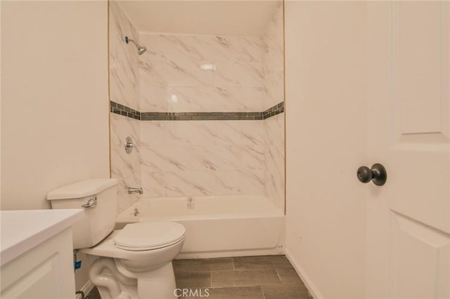 full bathroom featuring bathing tub / shower combination, vanity, toilet, and wood tiled floor