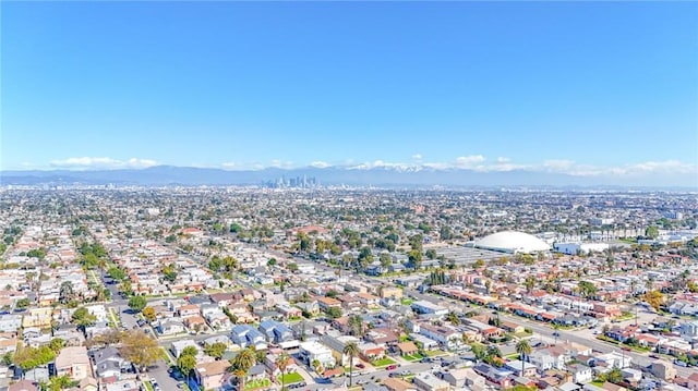 birds eye view of property featuring a mountain view and a residential view