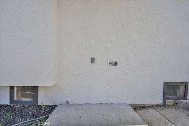 exterior space featuring stucco siding