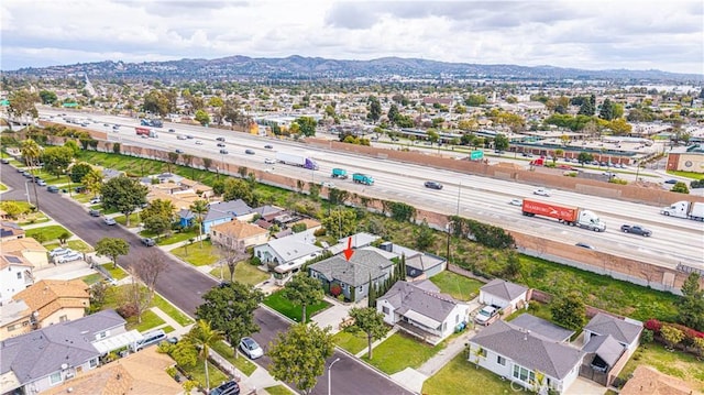 bird's eye view featuring a residential view and a mountain view