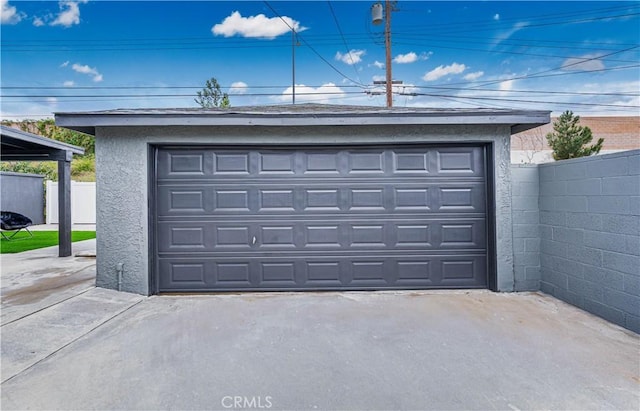 detached garage with fence