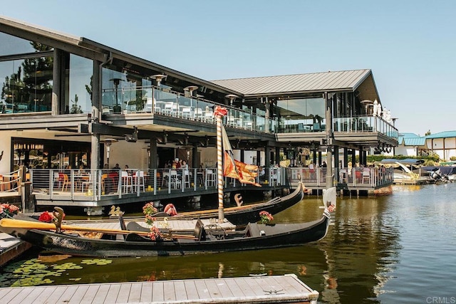 dock area with a water view