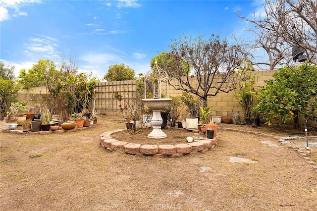 view of yard with a fenced backyard