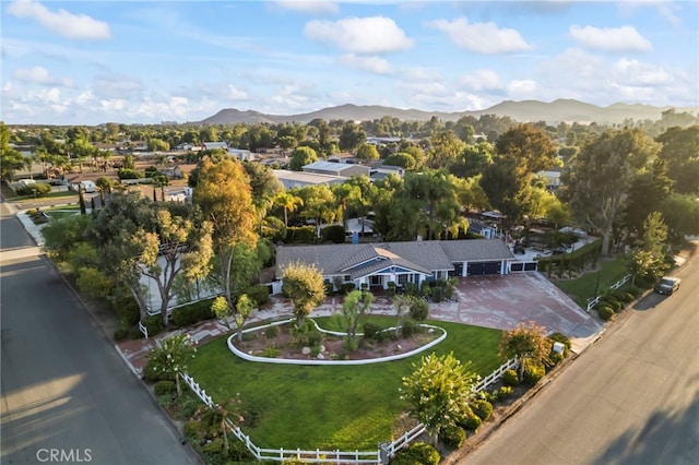 birds eye view of property featuring a mountain view