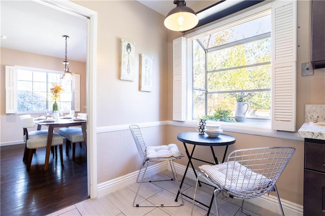 dining room with baseboards