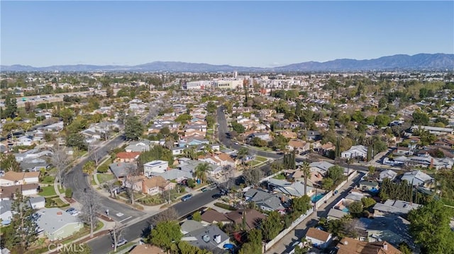 drone / aerial view with a residential view and a mountain view