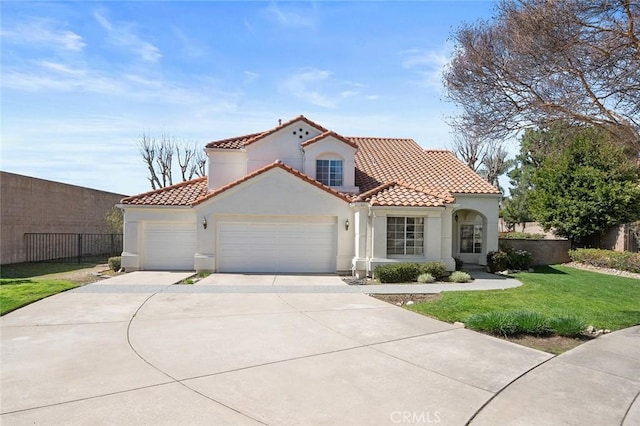 mediterranean / spanish-style house featuring a garage, a tile roof, fence, and stucco siding