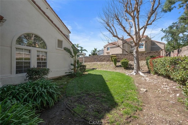 view of yard with fence