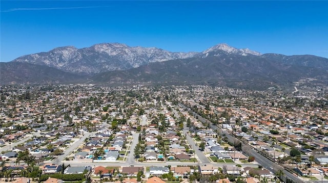 aerial view featuring a residential view and a mountain view