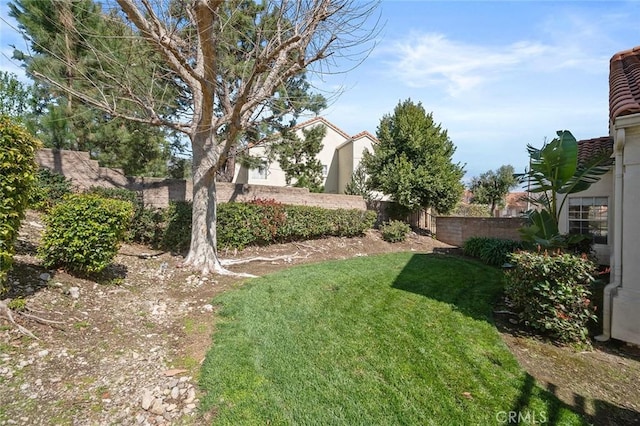 view of yard featuring fence