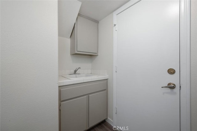 bathroom featuring vanity and wood finished floors