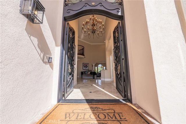 view of exterior entry featuring stucco siding