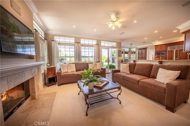 living room featuring light carpet, recessed lighting, a high end fireplace, and ornamental molding