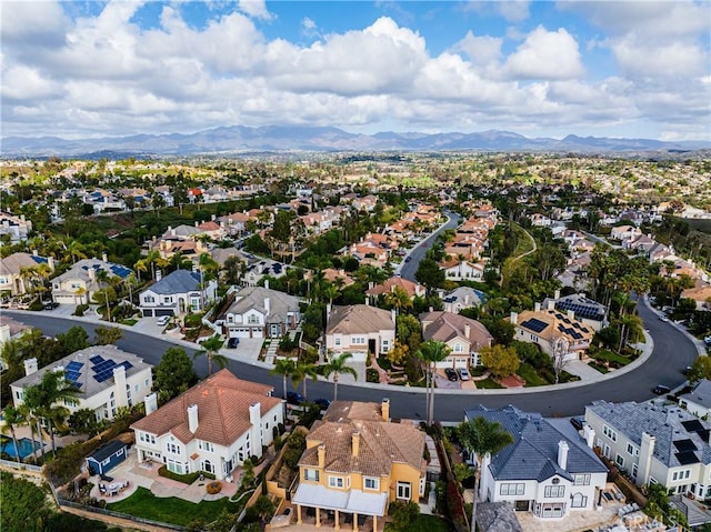 aerial view with a mountain view and a residential view