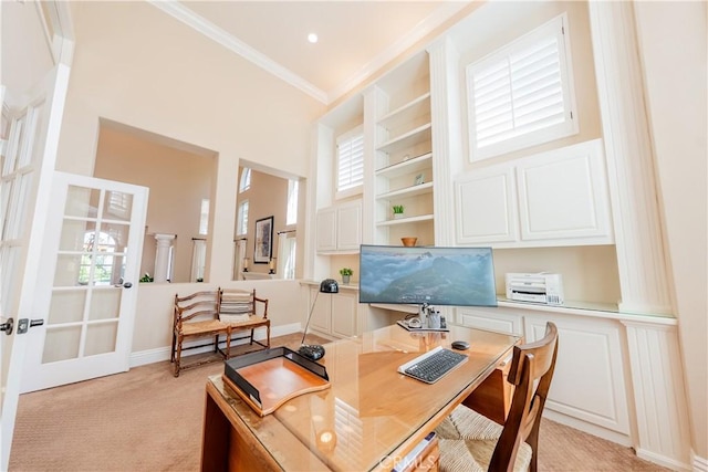 office with crown molding, baseboards, light colored carpet, french doors, and plenty of natural light