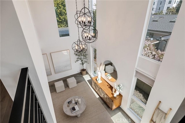 interior space with a chandelier and a high ceiling