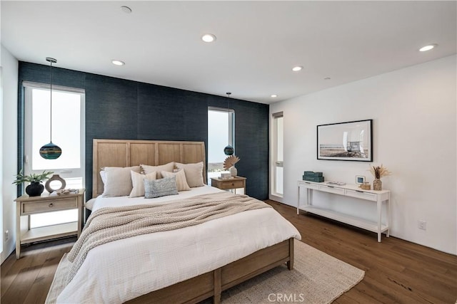 bedroom featuring dark wood-style floors and recessed lighting