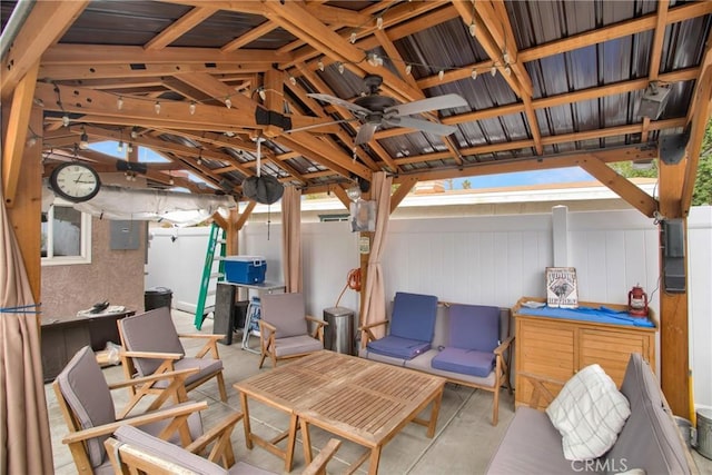 view of patio / terrace featuring ceiling fan, a gazebo, and fence