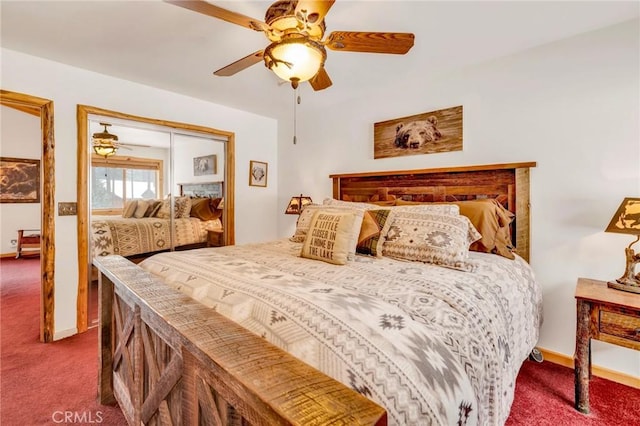 carpeted bedroom with a ceiling fan and baseboards