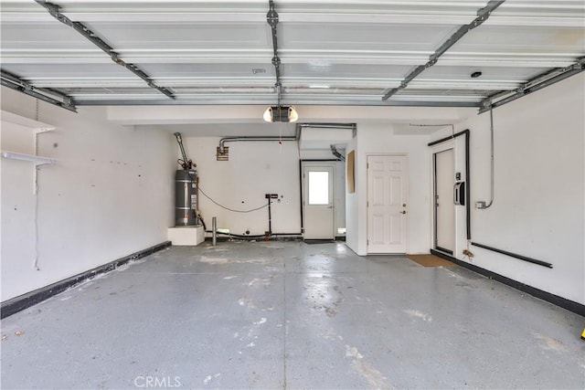 garage with a garage door opener and water heater