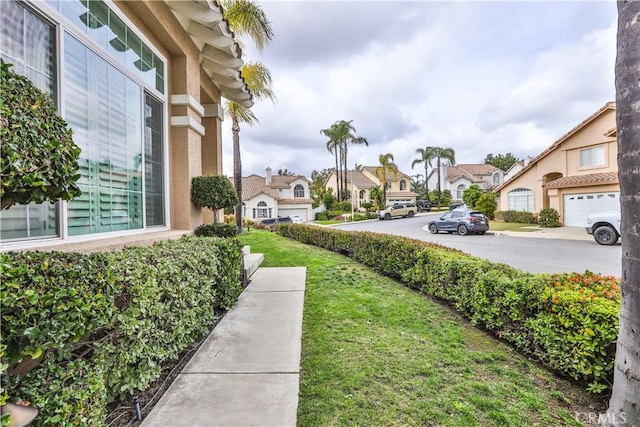 view of yard with a residential view