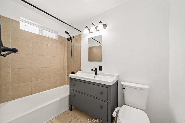 full bath featuring toilet, tile patterned flooring, tub / shower combination, and vanity