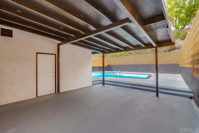 view of swimming pool with a patio area, a fenced backyard, and a fenced in pool