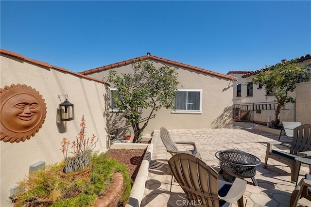 view of patio / terrace with fence