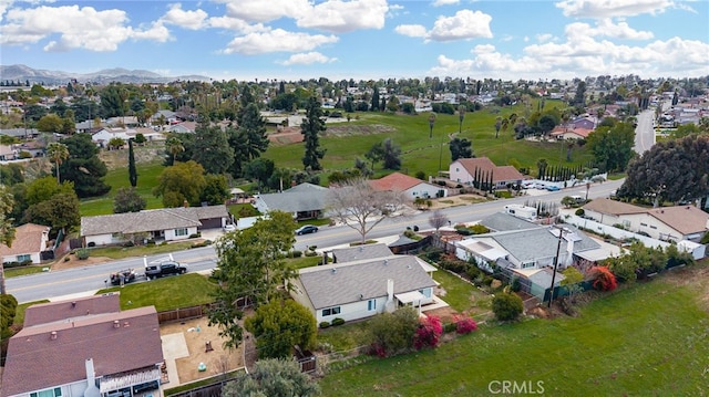 aerial view featuring a mountain view and a residential view