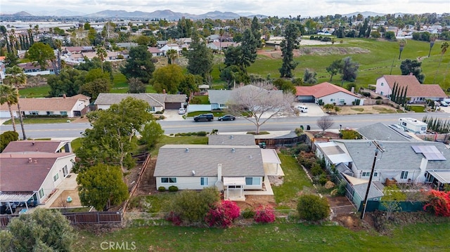 bird's eye view featuring a residential view and a mountain view