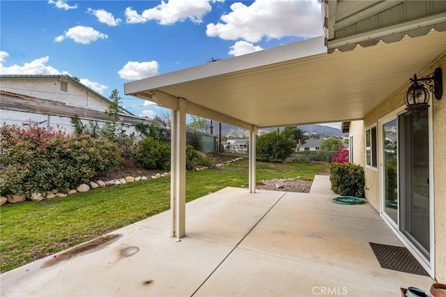 view of patio with fence