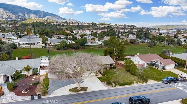 bird's eye view featuring a mountain view and a residential view