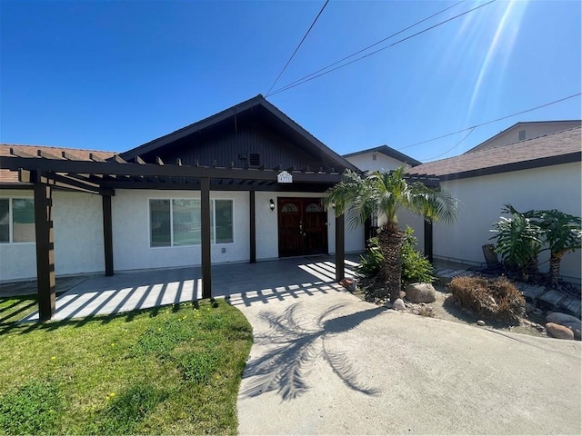 4771 68th St, La Mesa, CA 91942 - view of front of property with stucco siding and a pergola