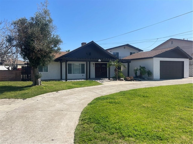 single story home featuring driveway, a garage, and a front lawn