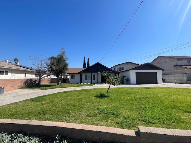 ranch-style house with an attached garage, concrete driveway, a front yard, and fence