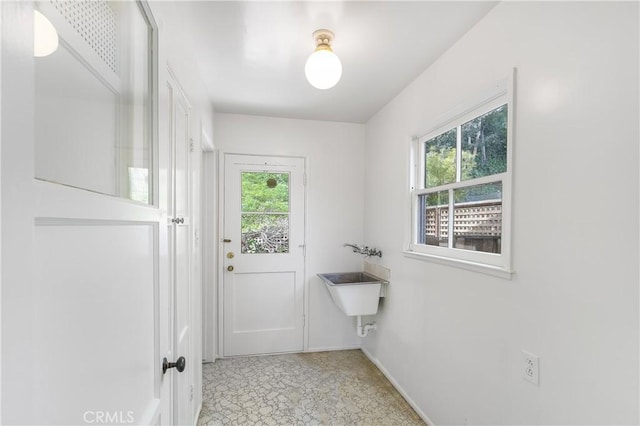 bathroom with baseboards