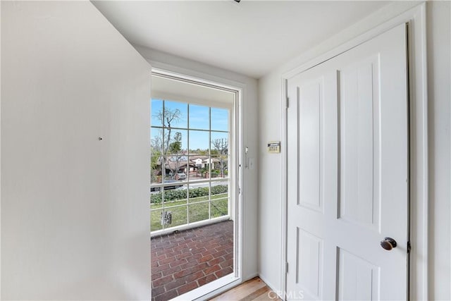 doorway with brick floor