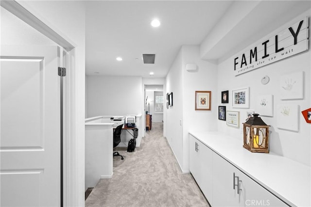 office area with recessed lighting and light colored carpet